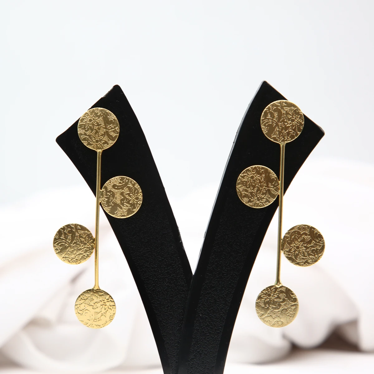gold-textured-disc-earrings-front Elegant textured gold disc long drop earrings with minimal statement design