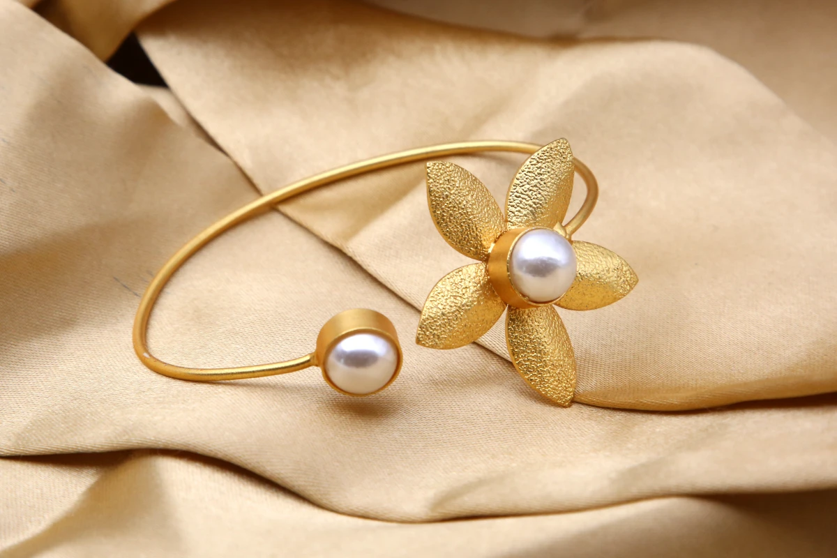 golden-pearl-floral-cuff-bracelet-front Golden Pearl Floral Open Bracelet with textured flower design