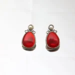 Red Monalisa stone vintage drop earrings with pearl detailing and antique silver finish